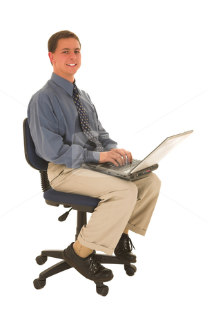 To use this stock image in your creative project, please select the size you need over to the right and click the "Add to Cart" button.
Your downloaded image will come with the Cutcaster watermark removed so don’t worry about the watermark you see on this page. Businessman #46 stock photo, Man sitting on a chair working on laptop. by Sean Nel