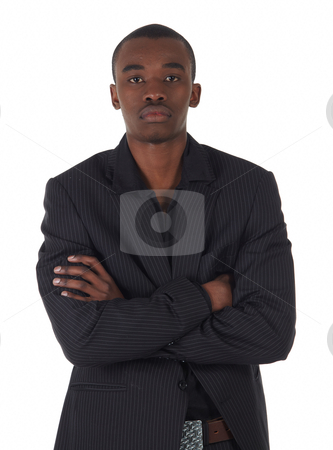 To use this stock image in your creative project, please select the size you need over to the right and click the "Add to Cart" button.
Your downloaded image will come with the Cutcaster watermark removed so don’t worry about the watermark you see on this page. Black African businessman stock photo, Young Adult black african businessman wearing a dark smart-casual suit and Jacket on a white background in various poses with various facial expressions. Part of a series, Not Isolated. by Sean Nel