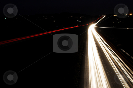 To use this stock image in your creative project, please select the size you need over to the right and click the "Add to Cart" button.
Your downloaded image will come with the Cutcaster watermark removed so don’t worry about the watermark you see on this page. Roads #5 stock photo, Light trails on highway by Sean Nel