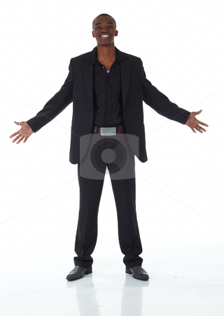 To use this stock image in your creative project, please select the size you need over to the right and click the "Add to Cart" button.
Your downloaded image will come with the Cutcaster watermark removed so don’t worry about the watermark you see on this page. Black African businessman stock photo, Young Adult black african businessman wearing a dark smart-casual suit and Jacket on a white background in various poses with various facial expressions. Part of a series, Not Isolated. by Sean Nel