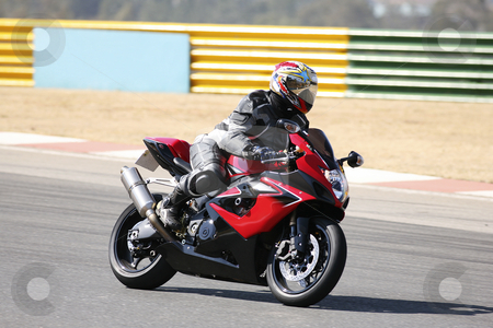 To use this stock image in your creative project, please select the size you need over to the right and click the "Add to Cart" button.
Your downloaded image will come with the Cutcaster watermark removed so don’t worry about the watermark you see on this page. Superbike #79 stock photo, High speed Superbike on the circuit by Sean Nel