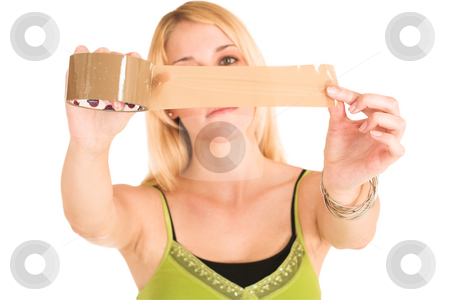 To use this stock image in your creative project, please select the size you need over to the right and click the "Add to Cart" button.
Your downloaded image will come with the Cutcaster watermark removed so don’t worry about the watermark you see on this page. Businesswoman #456 stock photo, Blonde business lady in an informal green top. Holding a piece of tape. shallow DOF, tape and hands in focus, face out of focus. by Sean Nel