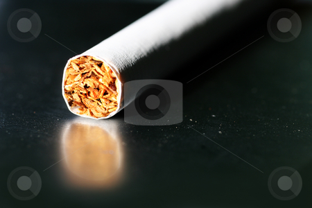 To use this stock image in your creative project, please select the size you need over to the right and click the "Add to Cart" button.
Your downloaded image will come with the Cutcaster watermark removed so don’t worry about the watermark you see on this page. Tobacco #2 stock photo, Single cigarettes on a cigarette case by Sean Nel