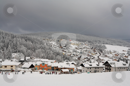 To use this stock image in your creative project, please select the size you need over to the right and click the "Add to Cart" button.
Your downloaded image will come with the Cutcaster watermark removed so don’t worry about the watermark you see on this page. Snow Landscape #8 stock photo, Ski Resort in Kirchberg by Sean Nel
