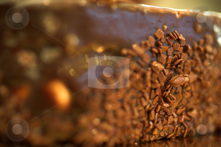 To use this stock image in your creative project, please select the size you need over to the right and click the "Add to Cart" button.
Your downloaded image will come with the Cutcaster watermark removed so don’t worry about the watermark you see on this page. Pastry #30 stock photo, Chocolate flakes on the side of a cake in a French Patisserie and Chocolaterie - Very Shallow Depth of Field, copy space by Sean Nel