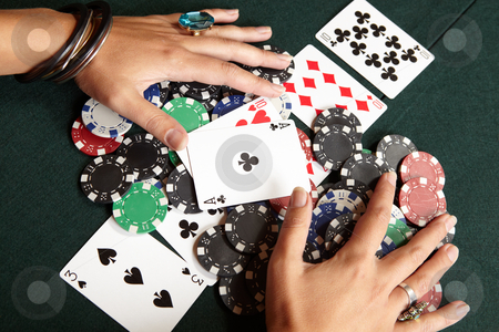 To use this stock image in your creative project, please select the size you need over to the right and click the "Add to Cart" button.
Your downloaded image will come with the Cutcaster watermark removed so don’t worry about the watermark you see on this page. Card gambling stock photo, Winning hand, three of a kind, Aces high. Playing cards, chips and player pulling winnings to herself on a green felt poker table by Sean Nel