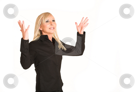 To use this stock image in your creative project, please select the size you need over to the right and click the "Add to Cart" button.
Your downloaded image will come with the Cutcaster watermark removed so don’t worry about the watermark you see on this page. Business Woman #295 stock photo, Blond business woman dressed in black trousers and a black shirt. Frustrated with hands in the air. Copy space by Sean Nel