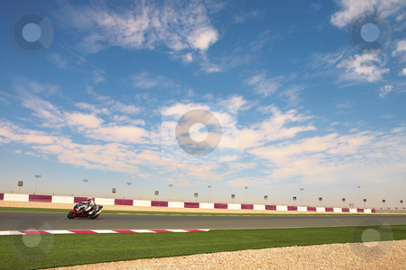 To use this stock image in your creative project, please select the size you need over to the right and click the "Add to Cart" button.
Your downloaded image will come with the Cutcaster watermark removed so don’t worry about the watermark you see on this page. Lusail Racetrack stock photo, Section of astro turf and asphalt next to the Lusail GP and race track. Main straight grandstand and pavilion by Sean Nel