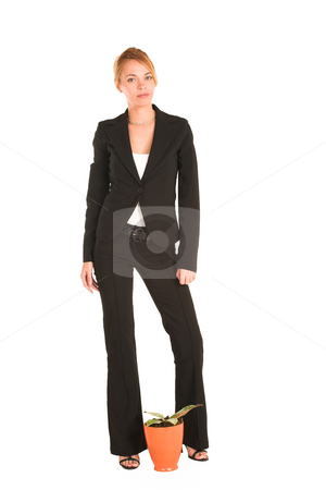 To use this stock image in your creative project, please select the size you need over to the right and click the "Add to Cart" button.
Your downloaded image will come with the Cutcaster watermark removed so don’t worry about the watermark you see on this page. Businesswoman #239 stock photo, Blonde business lady in formal black suit. Standing behind a small potplant. by Sean Nel