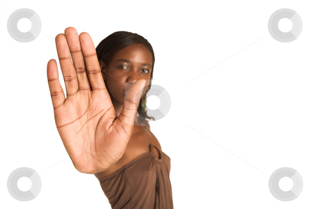 To use this stock image in your creative project, please select the size you need over to the right and click the "Add to Cart" button.
Your downloaded image will come with the Cutcaster watermark removed so don’t worry about the watermark you see on this page. Cynthia Akva #18 stock photo, African business woman dressed in neutral coloured clothes. Holding her hand up in front of face. copy space by Sean Nel