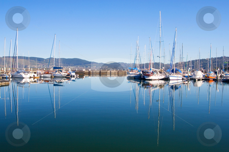 To use this stock image in your creative project, please select the size you need over to the right and click the "Add to Cart" button.
Your downloaded image will come with the Cutcaster watermark removed so don’t worry about the watermark you see on this page. Harbour #11 stock photo, Boats at Knysna Harbour, South Africa by Sean Nel