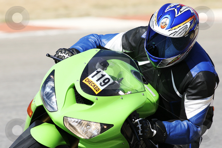 To use this stock image in your creative project, please select the size you need over to the right and click the "Add to Cart" button.
Your downloaded image will come with the Cutcaster watermark removed so don’t worry about the watermark you see on this page. Superbike #55 stock photo, High speed Superbike on the circuit by Sean Nel