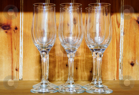 To use this stock image in your creative project, please select the size you need over to the right and click the "Add to Cart" button.
Your downloaded image will come with the Cutcaster watermark removed so don’t worry about the watermark you see on this page. Glass stock photo, 6 Champagne glasses, in front of a wooden pannel by Sean Nel