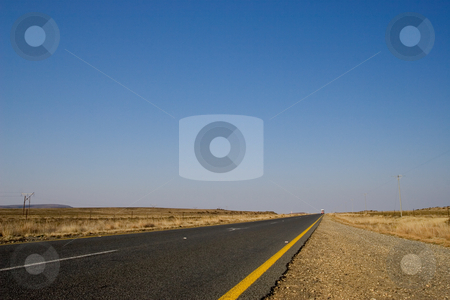 To use this stock image in your creative project, please select the size you need over to the right and click the "Add to Cart" button.
Your downloaded image will come with the Cutcaster watermark removed so don’t worry about the watermark you see on this page. Cape roads #3 stock photo, Desolate road just outside Colesberg, South Africa by Sean Nel