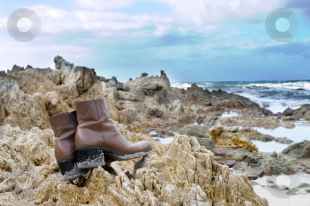 To use this stock image in your creative project, please select the size you need over to the right and click the "Add to Cart" button.
Your downloaded image will come with the Cutcaster watermark removed so don’t worry about the watermark you see on this page. Shoes #14 stock photo, Brown leather boots on the rocks at the sea by Sean Nel