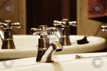 To use this stock image in your creative project, please select the size you need over to the right and click the "Add to Cart" button.
Your downloaded image will come with the Cutcaster watermark removed so don’t worry about the watermark you see on this page. Bathroom Tap stock photo, Tap and basin in bathroom by Sean Nel
