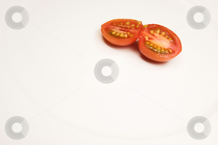 To use this stock image in your creative project, please select the size you need over to the right and click the "Add to Cart" button.
Your downloaded image will come with the Cutcaster watermark removed so don’t worry about the watermark you see on this page. Food #44 stock photo, A cherry tomato on a white plate by Sean Nel