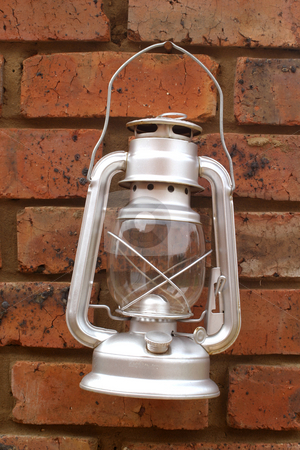 To use this stock image in your creative project, please select the size you need over to the right and click the "Add to Cart" button.
Your downloaded image will come with the Cutcaster watermark removed so don’t worry about the watermark you see on this page. Silver storm lantern stock photo, Tin Storm lantern by Sean Nel