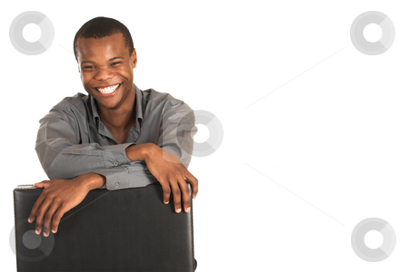 To use this stock image in your creative project, please select the size you need over to the right and click the "Add to Cart" button.
Your downloaded image will come with the Cutcaster watermark removed so don’t worry about the watermark you see on this page. Businessman #145 stock photo, Businessman with grey shirt. Holding a leather suitcase, smiling. Copy space. by Sean Nel