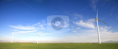 To use this stock image in your creative project, please select the size you need over to the right and click the "Add to Cart" button.
Your downloaded image will come with the Cutcaster watermark removed so don’t worry about the watermark you see on this page. Wind powered turbine stock photo, Panoramic image of wind powered electricity generator standing against the blue sky on a wind farm by Sean Nel