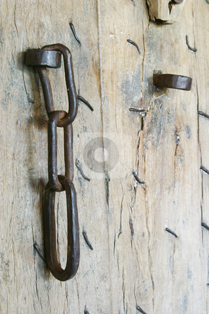 To use this stock image in your creative project, please select the size you need over to the right and click the "Add to Cart" button.
Your downloaded image will come with the Cutcaster watermark removed so don’t worry about the watermark you see on this page. Chain on door stock photo, Old chain on morrocan weathered door by Sean Nel