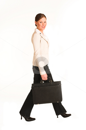 To use this stock image in your creative project, please select the size you need over to the right and click the "Add to Cart" button.
Your downloaded image will come with the Cutcaster watermark removed so don’t worry about the watermark you see on this page. Business Woman #223(GS) stock photo, Business woman dressed in jeans and a beige jacket. Walking. Movement by Sean Nel