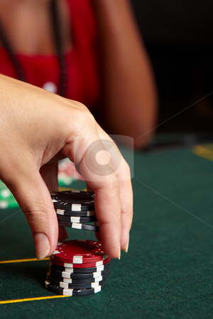 To use this stock image in your creative project, please select the size you need over to the right and click the "Add to Cart" button.
Your downloaded image will come with the Cutcaster watermark removed so don’t worry about the watermark you see on this page. Card gambling stock photo, Playing cards, chips and players gambling around a green felt poker table. Shallow Depth of field, focus on red chips by Sean Nel