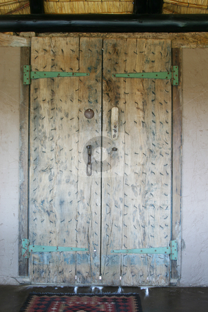 To use this stock image in your creative project, please select the size you need over to the right and click the "Add to Cart" button.
Your downloaded image will come with the Cutcaster watermark removed so don’t worry about the watermark you see on this page. Moroccan door stock photo, Old weathered hand made door by Sean Nel