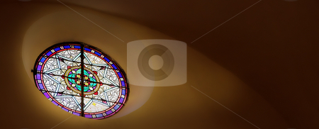 To use this stock image in your creative project, please select the size you need over to the right and click the "Add to Cart" button.
Your downloaded image will come with the Cutcaster watermark removed so don’t worry about the watermark you see on this page. St Paul #20 stock photo, Stained glass window close to the roof inside a chapel by Sean Nel