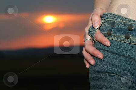 To use this stock image in your creative project, please select the size you need over to the right and click the "Add to Cart" button.
Your downloaded image will come with the Cutcaster watermark removed so don’t worry about the watermark you see on this page. Sunset jeans stock photo, Girl in blue jeans at sunset by Sean Nel