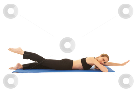 To use this stock image in your creative project, please select the size you need over to the right and click the "Add to Cart" button.
Your downloaded image will come with the Cutcaster watermark removed so don’t worry about the watermark you see on this page. Pilates exercise series stock photo, Fit young brunette pilates instructor showing different exercises on a white background a blue yoga mat. White background NOT ISOLATED by Sean Nel
