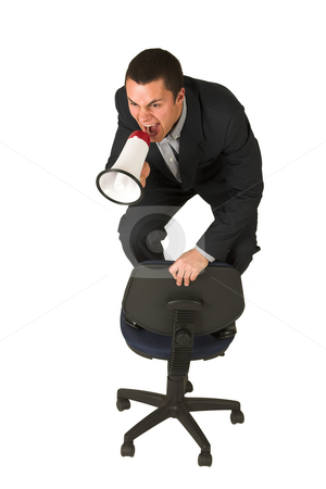 To use this stock image in your creative project, please select the size you need over to the right and click the "Add to Cart" button.
Your downloaded image will come with the Cutcaster watermark removed so don’t worry about the watermark you see on this page. Businessman #243 stock photo, Businessman wearing a suit and a grey shirt. Making a stunt on an office chair with a megaphone in his hand. by Sean Nel