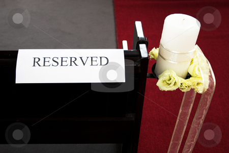 To use this stock image in your creative project, please select the size you need over to the right and click the "Add to Cart" button.
Your downloaded image will come with the Cutcaster watermark removed so don’t worry about the watermark you see on this page. Wedding #27 stock photo, Reserved sign on chapel bench by Sean Nel
