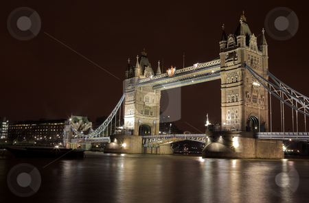 To use this stock image in your creative project, please select the size you need over to the right and click the "Add to Cart" button.
Your downloaded image will come with the Cutcaster watermark removed so don’t worry about the watermark you see on this page. Tower Bridge #5 stock photo, The bascule Tower bridge in London, Night Scene over the Thames by Sean Nel