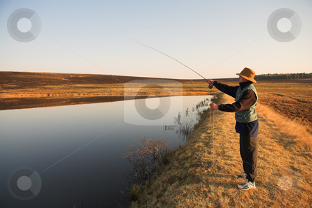 To use this stock image in your creative project, please select the size you need over to the right and click the "Add to Cart" button.
Your downloaded image will come with the Cutcaster watermark removed so don’t worry about the watermark you see on this page. Flyfishing #26 stock photo, A fly fisherman casting a line in Dullstroom, South Africa by Sean Nel