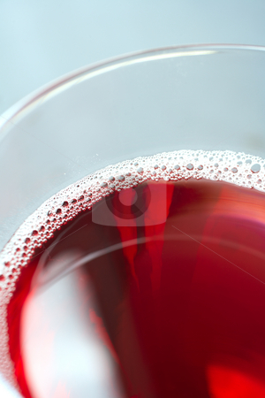 To use this stock image in your creative project, please select the size you need over to the right and click the "Add to Cart" button.
Your downloaded image will come with the Cutcaster watermark removed so don’t worry about the watermark you see on this page. Red wine stock photo, Glass of freshly poured red wine by Sean Nel