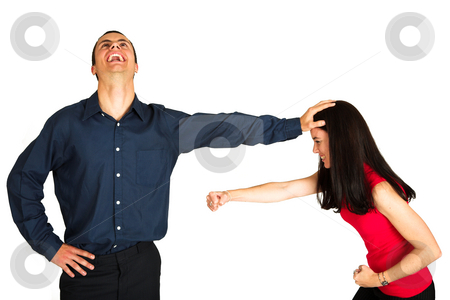 To use this stock image in your creative project, please select the size you need over to the right and click the "Add to Cart" button.
Your downloaded image will come with the Cutcaster watermark removed so don’t worry about the watermark you see on this page. Businessman fighting with businesswoman on white background stock photo, Businessman holding a female coworker away who is trying to hit him while laughing manically. The couple is isolated on white. Image can be used for office politics or keeping woman out of management areas or rising in the workplace. by Sean Nel