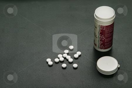 To use this stock image in your creative project, please select the size you need over to the right and click the "Add to Cart" button.
Your downloaded image will come with the Cutcaster watermark removed so don’t worry about the watermark you see on this page. Pills and a bottle stock photo, Medication in a botttle by Sean Nel