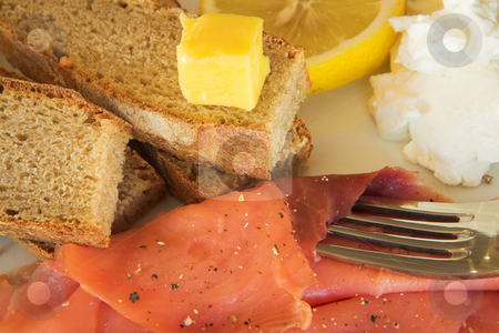 To use this stock image in your creative project, please select the size you need over to the right and click the "Add to Cart" button.
Your downloaded image will come with the Cutcaster watermark removed so don’t worry about the watermark you see on this page. Lunch #16 stock photo, Whole wheat bread with salmon, lemon and cream on a plate by Sean Nel