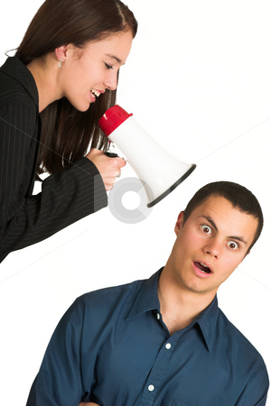 To use this stock image in your creative project, please select the size you need over to the right and click the "Add to Cart" button.
Your downloaded image will come with the Cutcaster watermark removed so don’t worry about the watermark you see on this page. Business People # 45 stock photo, A brunette woman yelling at her male business partner over a microphone. by Sean Nel