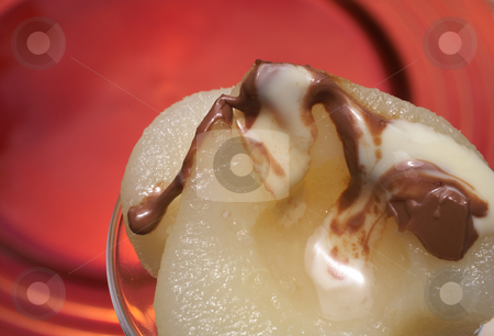 To use this stock image in your creative project, please select the size you need over to the right and click the "Add to Cart" button.
Your downloaded image will come with the Cutcaster watermark removed so don’t worry about the watermark you see on this page. Fresh pear dessert stock photo, Fresh pear desert with melted white and milk chocolate topping by Sean Nel