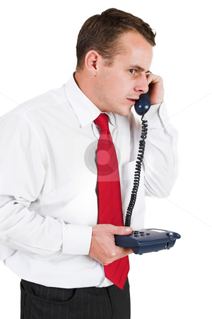 To use this stock image in your creative project, please select the size you need over to the right and click the "Add to Cart" button.
Your downloaded image will come with the Cutcaster watermark removed so don’t worry about the watermark you see on this page. Tollie Booysen #18 stock photo, Businessman in black trousers, white shirt and red tie. Talking on the phone by Sean Nel