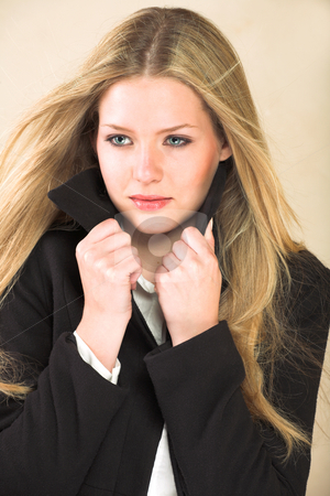 To use this stock image in your creative project, please select the size you need over to the right and click the "Add to Cart" button.
Your downloaded image will come with the Cutcaster watermark removed so don’t worry about the watermark you see on this page. Young adult woman stock photo, Portrait of a beautiful young adult Caucasian woman with light skin and straight blond hair, green eyes and red lips, wearing a white shirt and black flannel winter coat by Sean Nel