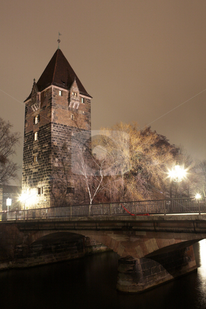 To use this stock image in your creative project, please select the size you need over to the right and click the "Add to Cart" button.
Your downloaded image will come with the Cutcaster watermark removed so don’t worry about the watermark you see on this page. Neurenburg #66 stock photo, Jail and Pegnitz river in Neurenburg at nighttime. by Sean Nel