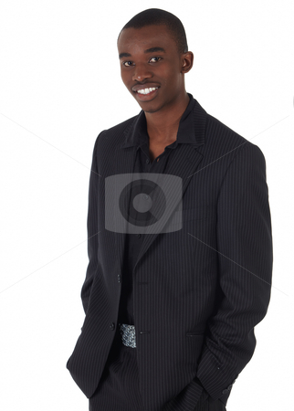 To use this stock image in your creative project, please select the size you need over to the right and click the "Add to Cart" button.
Your downloaded image will come with the Cutcaster watermark removed so don’t worry about the watermark you see on this page. Black African businessman stock photo, Young Adult black african businessman wearing a dark smart-casual suit and Jacket on a white background in various poses with various facial expressions. Part of a series, Not Isolated. by Sean Nel
