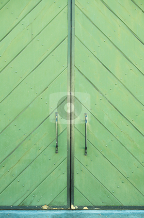 To use this stock image in your creative project, please select the size you need over to the right and click the "Add to Cart" button.
Your downloaded image will come with the Cutcaster watermark removed so don’t worry about the watermark you see on this page. Green door of a building stock photo, Green door of a building with metal door handles and beautiful texture of paint by Sean Nel