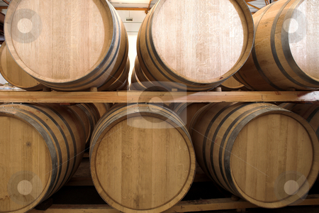 To use this stock image in your creative project, please select the size you need over to the right and click the "Add to Cart" button.
Your downloaded image will come with the Cutcaster watermark removed so don’t worry about the watermark you see on this page. Oak barrels maturing red wine and brandy stock photo, Stacked Oak barrels for maturing red wine and brandy in a cooling cellar. Made from American and Canadian oak and stacked in rows. (low noise HDR file by Sean Nel