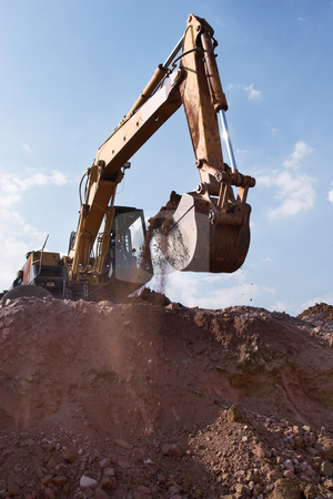 To use this stock image in your creative project, please select the size you need over to the right and click the "Add to Cart" button.
Your downloaded image will come with the Cutcaster watermark removed so don’t worry about the watermark you see on this page. Construction #5 stock photo, Backactor busy excavating by Sean Nel