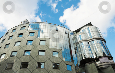 To use this stock image in your creative project, please select the size you need over to the right and click the "Add to Cart" button.
Your downloaded image will come with the Cutcaster watermark removed so don’t worry about the watermark you see on this page. Vienna #67 stock photo, Steel and Glass building in Vienna, Austria - Blue Sky by Sean Nel