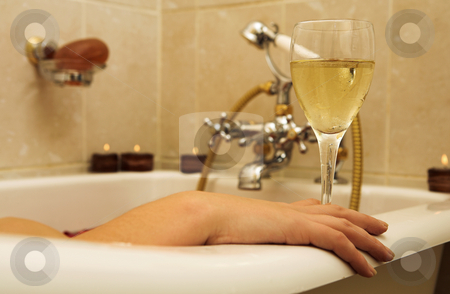 To use this stock image in your creative project, please select the size you need over to the right and click the "Add to Cart" button.
Your downloaded image will come with the Cutcaster watermark removed so don’t worry about the watermark you see on this page. Woman #95 stock photo, Woman in a bath, holding a champagne glass. by Sean Nel